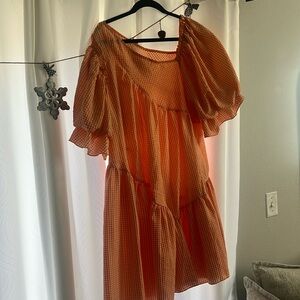 Asymmetrical orange and white gingham dress